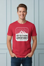 Red t-shirt with a mountain graphic and 'Say Yes to New Adventures' text on a white background