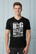 Person wearing a black t-shirt with white text on a white background