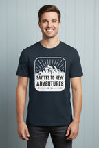 Navy blue t-shirt with mountain graphic and 'Say Yes to New Adventures' text on a white background