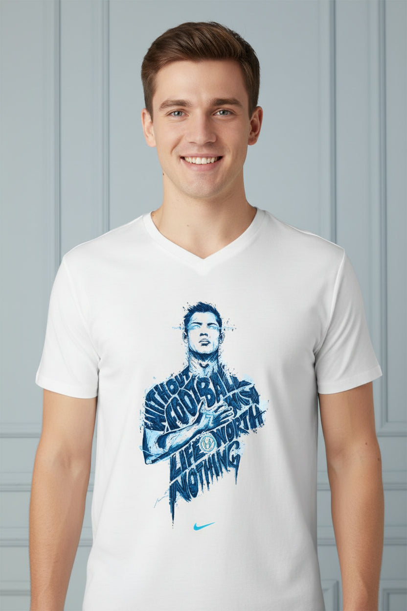 A man wearing a white V-neck t-shirt with a blue graphic print of a football player and the text 'LIFEWORTH NOTHING' on the front, paired with black pants against a light gray background.